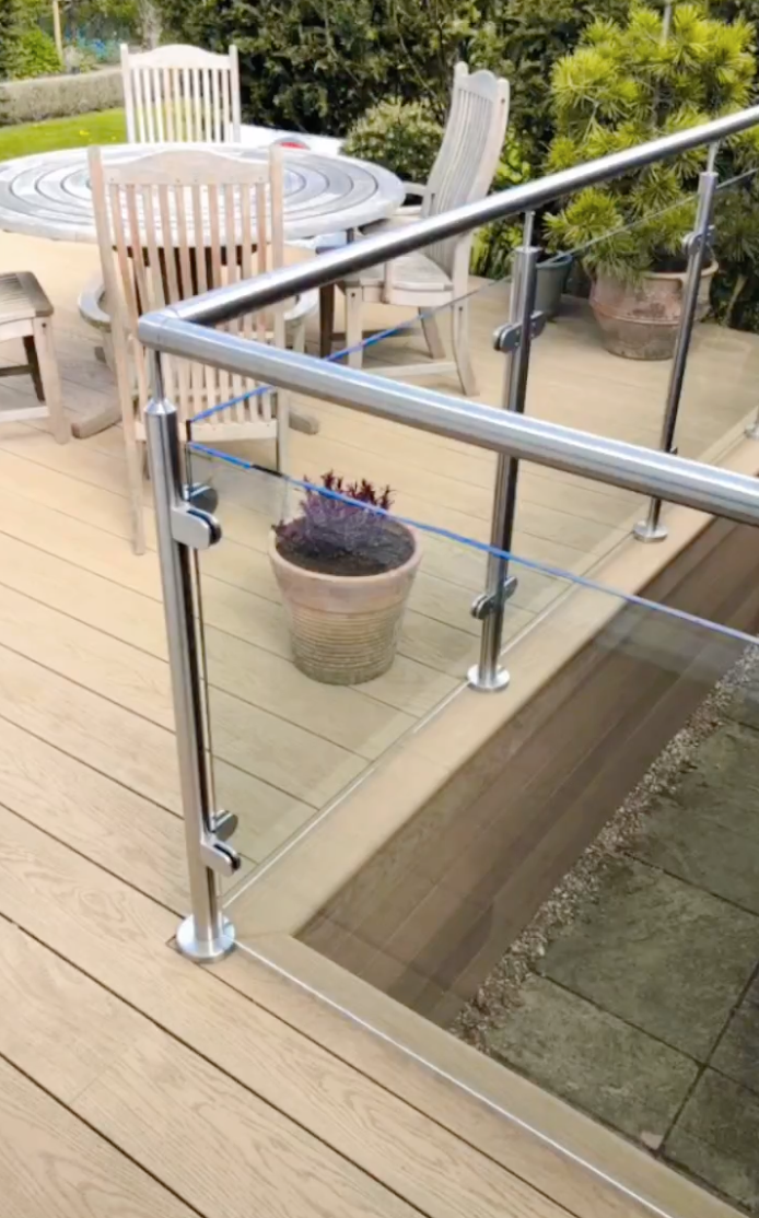 Imahe shows a newly installed deck, installed by garden decking contractors