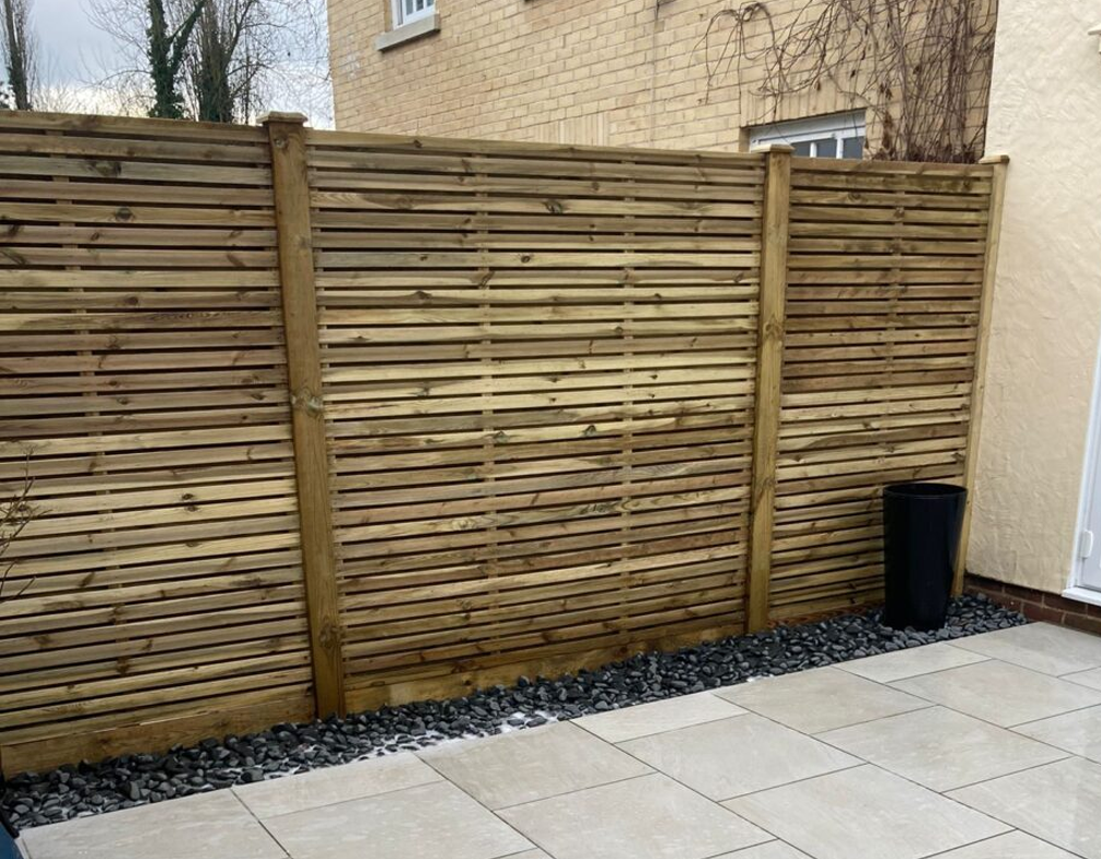 Image shows a newly installed grden fence. Image depicts Thomas Charles Landscapes' garden & landscaping services