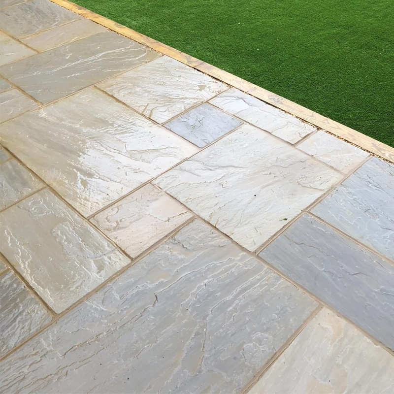 image shows a natural stone patio