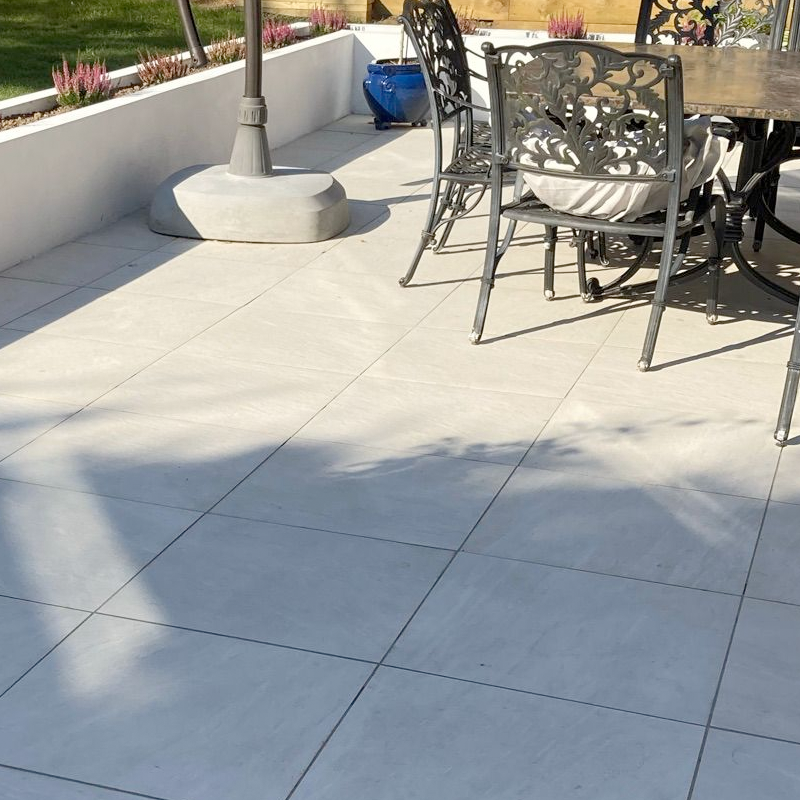 Image shows a porcelain garden paving & patio installation