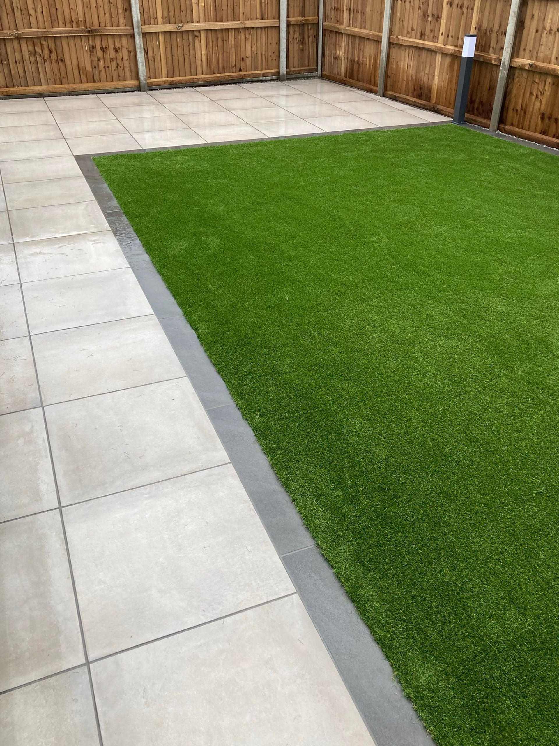 new lawn hertfordshire Image shows a newly laid artificial lawn. Image depicts new lawn Hertfordshire